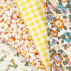 Mønstret stoff gul mix